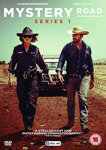 DVD cover for "Mystery Road" featuring two police officers in a rural landscape.