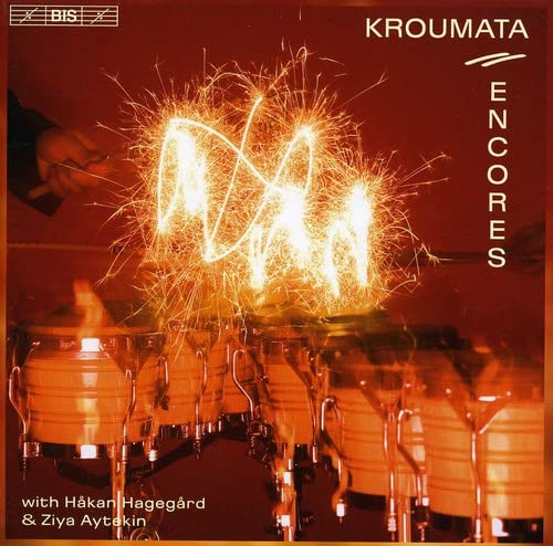 CD cover: percussion instruments with sparklers and text “Kroumata Encores”.