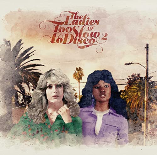 CD cover featuring two women in front of a palm tree landscape.
