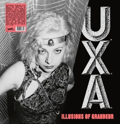 Black and white album cover featuring a woman with wild hair and bold lettering.