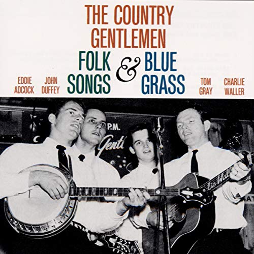 Black and white photo of four men with bluegrass instruments.