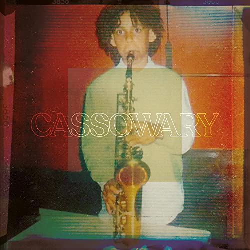 Vinyl LP cover featuring a person playing a saxophone, distressed effect.