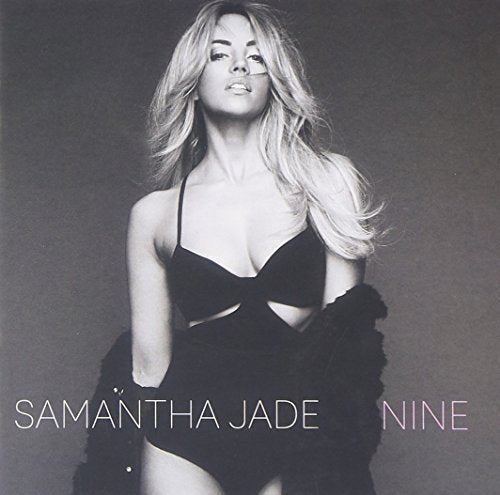 Black and white album cover featuring singer Samantha Jade in a black bra.
