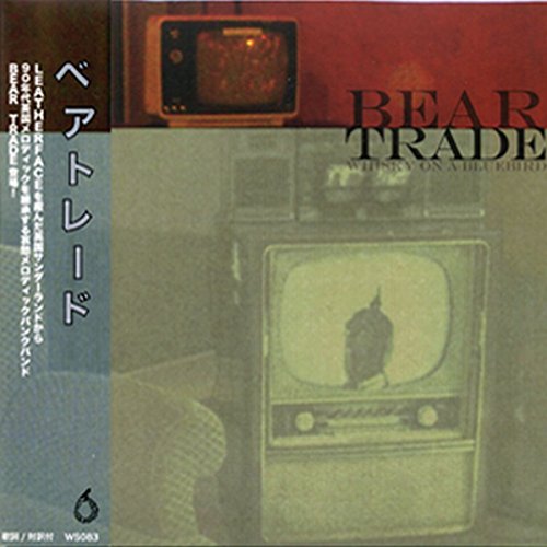 CD cover with vintage television displaying a bird silhouette.