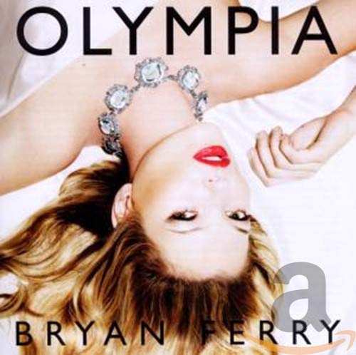 Album cover featuring a woman with blonde hair and a jeweled necklace lying down.