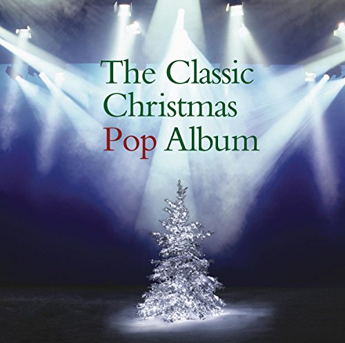 CD cover with a lit Christmas tree under spotlights.