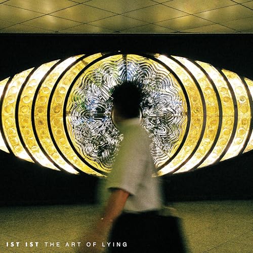 Album cover with a blurred figure walking towards a glowing yellow oval.