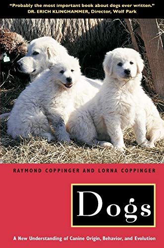 Book cover featuring three fluffy white puppies and the title "Dogs.