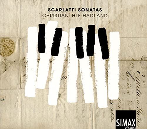 CD cover with piano keys and aged paper background.