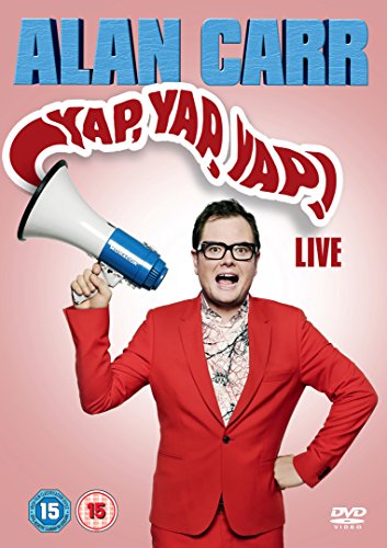 Alan Carr in a red suit holding a megaphone on DVD cover.