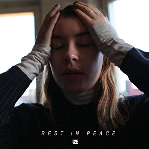 Woman with eyes closed, hands on head, album cover "Rest In Peace".