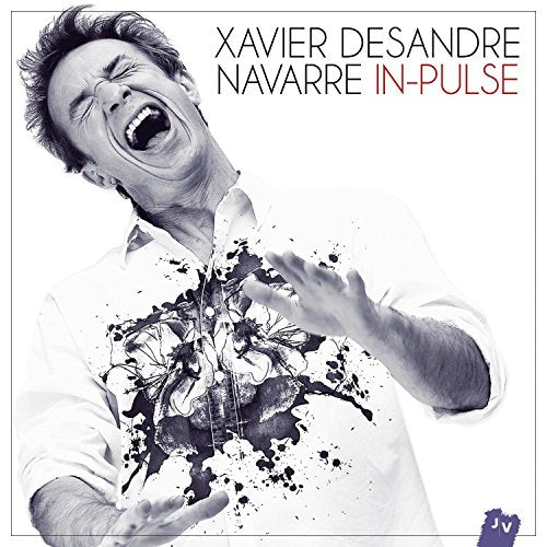 Black and white CD cover featuring a man with outstretched arms and paint splatters.
