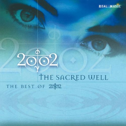 CD cover for “2002 - The Sacred Well” featuring eyes and the number 2002.