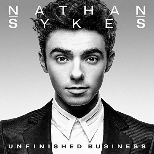 Nathan Sykes album cover, black and white portrait, “Unfinished Business.”