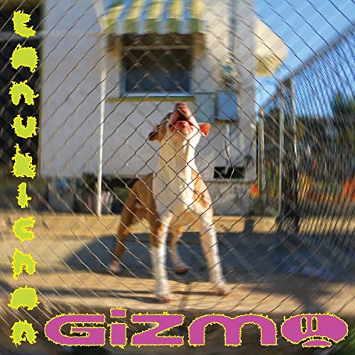 CD cover featuring a dog behind a chain-link fence, with text “Gizmo”.