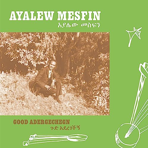 Vinyl cover featuring a sepia-toned photo of Ayalew Mesfin on a green background.
