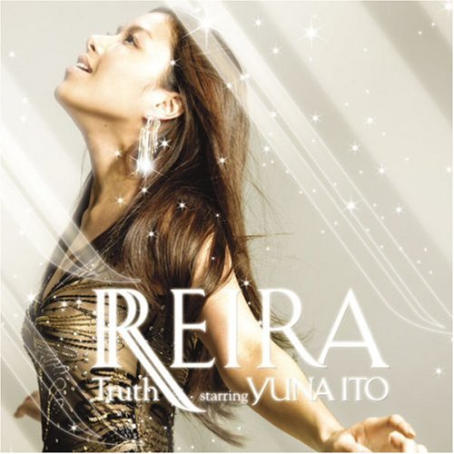 CD cover featuring a woman looking upwards with sparkling effects.