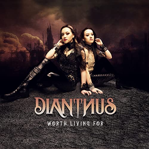 CD cover: two women in dark clothing before a smoky, ruined cityscape.