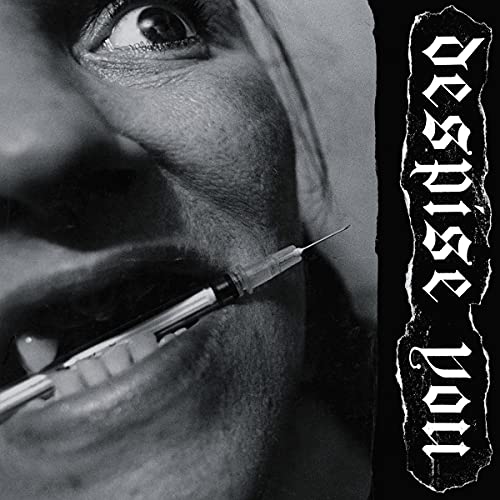 Black and white CD cover with a face and a syringe near the mouth.