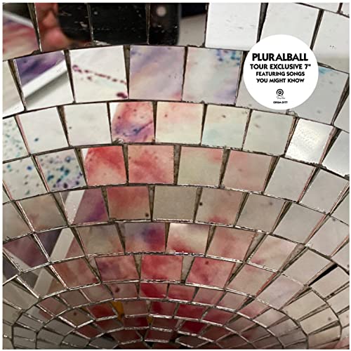 Mosaic-covered disco ball with a white sticker reading "PLURALBALL TOUR EXCLUSIVE.