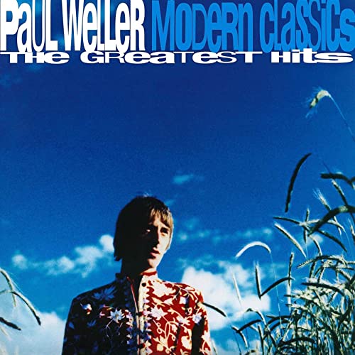 Album cover for Paul Weller’s “Modern Classics” with a blue sky background.