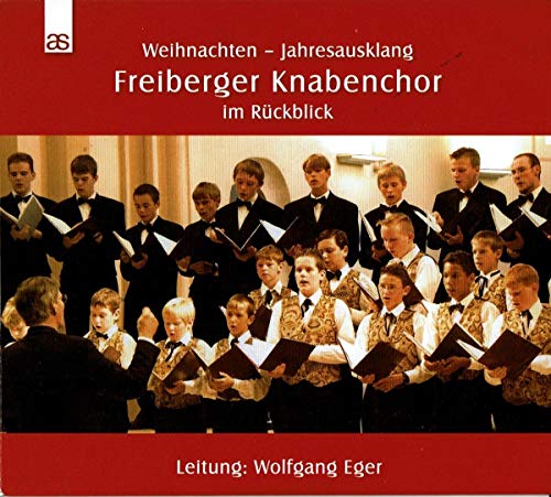 CD cover featuring a boys’ choir in formal wear singing.