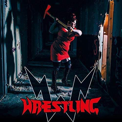 CD cover: woman with axe in distressed, industrial setting.
