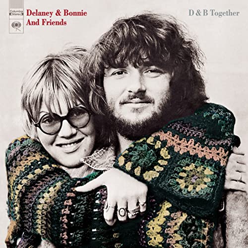 Album cover featuring Delaney & Bonnie in colorful patterned sweaters, embracing.