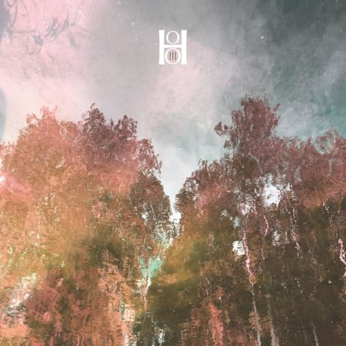 Album cover with abstract trees and a geometric logo at the top.