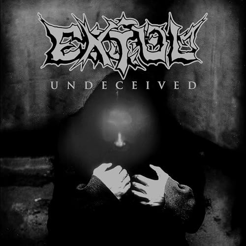 Extol album cover: dark figure with obscured face, band logo, and title.