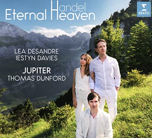 CD cover featuring three people in white against a mountain backdrop.