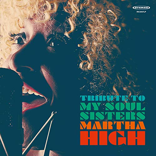 Album cover featuring Martha High singing into a microphone.
