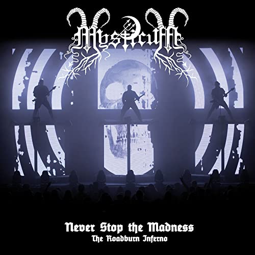 Mysticum album cover: band silhouetted onstage before a crowd.