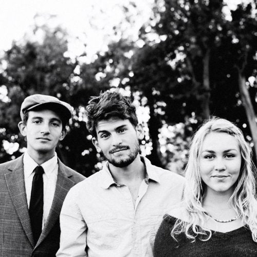 Black and white portrait of three young adults, likely a band.