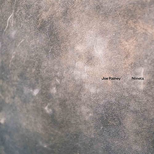CD cover for Joe Rainey’s “Niineta” with a textured, mottled brown background.
