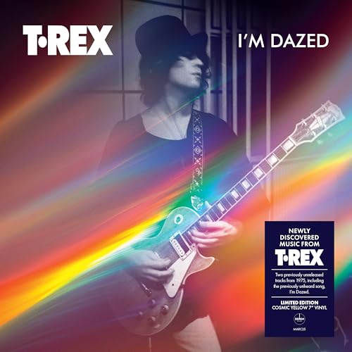 T.Rex album cover featuring Marc Bolan with a guitar, rainbow light streaks.