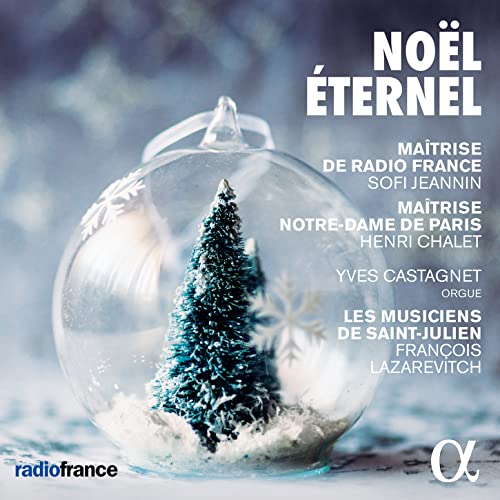 CD cover: Christmas ornament with a miniature tree inside, snowy background.