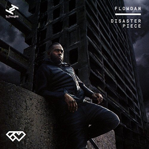 Flowdan album cover: man in dark clothing before a ruined building.