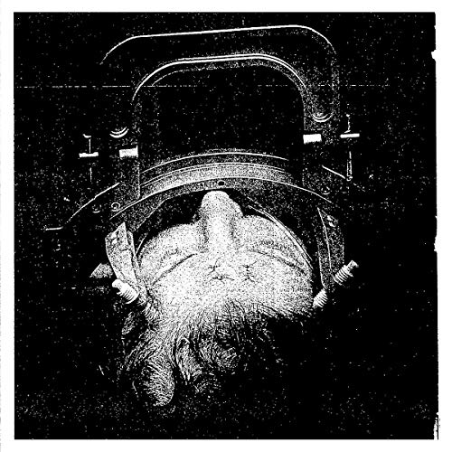 Black and white vinyl record cover with a distorted face image.