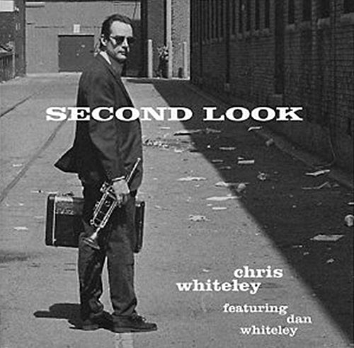 CD cover: Chris Whiteley with trumpet, standing in an alleyway.