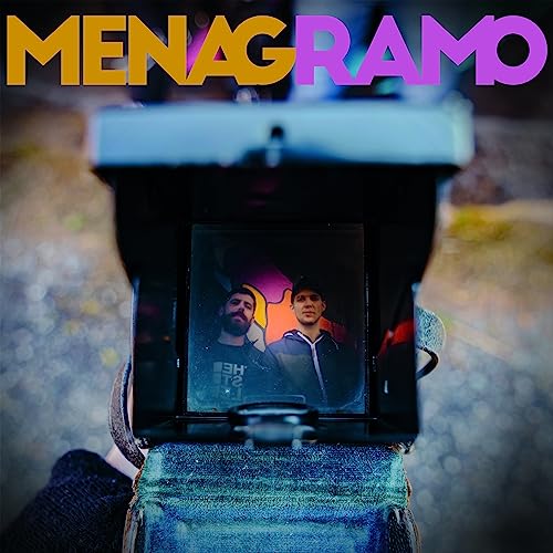 Album cover for Menagramo featuring two men viewed through a toy camera.