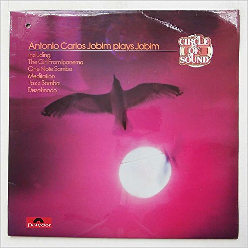 Antonio Carlos Jobim album cover with a bird silhouetted against a sun.