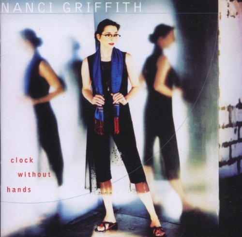 Nanci Griffith album cover, woman in black with blurred figures.