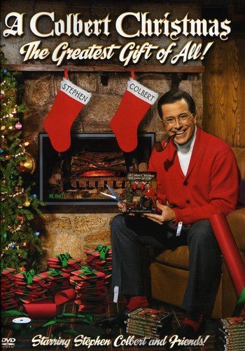 DVD cover ofC featuring Stephen Colbert in a red cardigan by a Christmas fireplace.