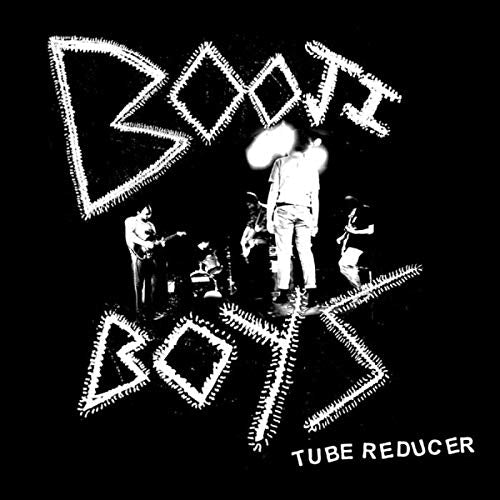 Black and white album cover for Booji Boys’ “Tube Reducer” featuring a band photo.