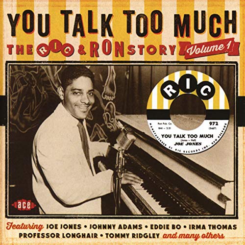 CD cover featuring a smiling man singing into a vintage microphone.