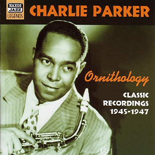 Charlie Parker holding a saxophone on a green-tinted CD cover with orange text.