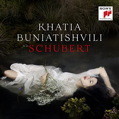 CD cover: pianist Khatia Buniatishvili lying in a field of flowers.