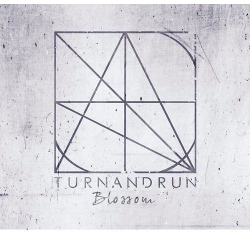 CD cover for "Blossom" with abstract geometric lines and text.