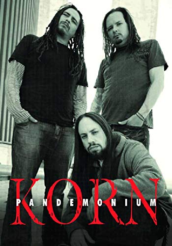 Korn band members posing, with "Pandemonium" title in red lettering.